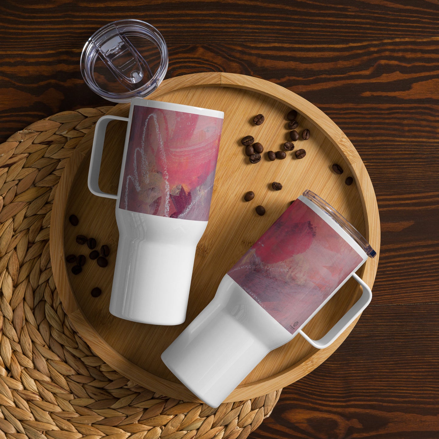 Travel mug with a handle