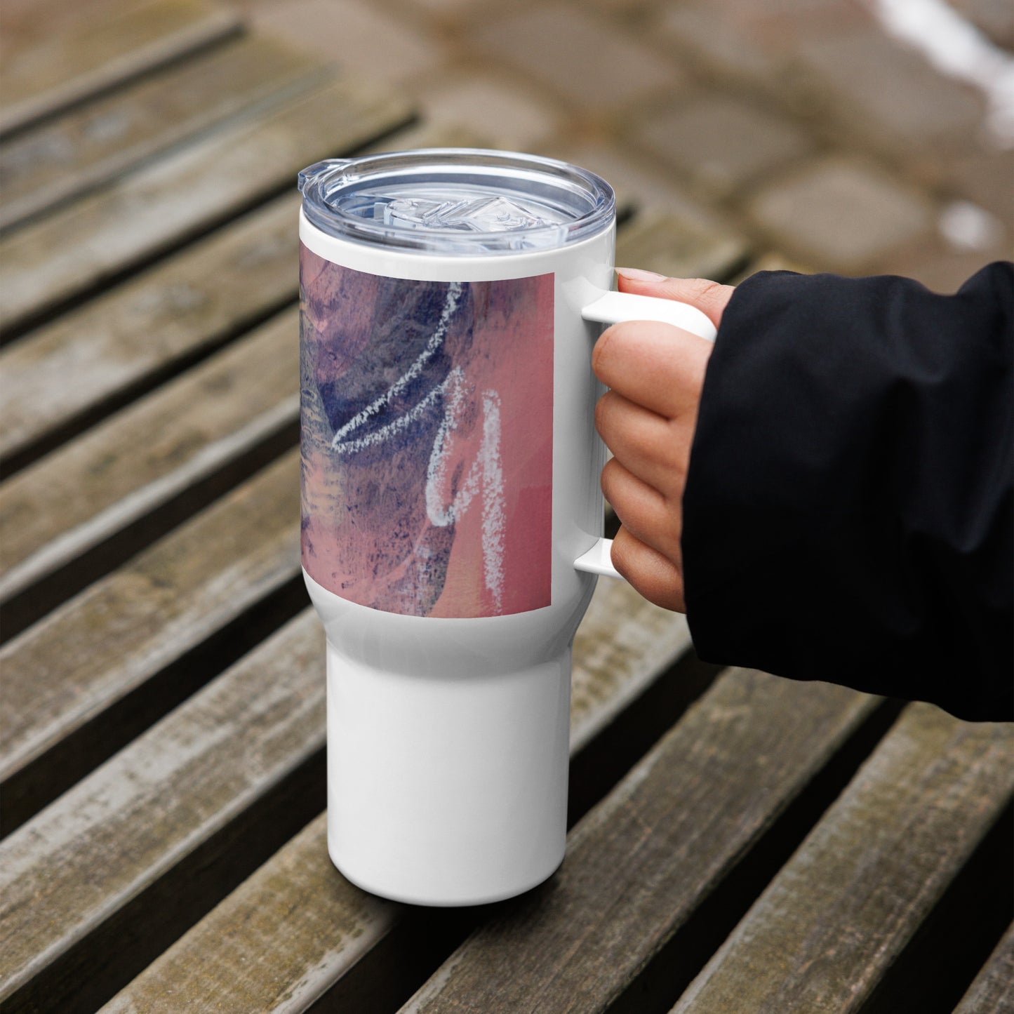 Travel mug with a handle